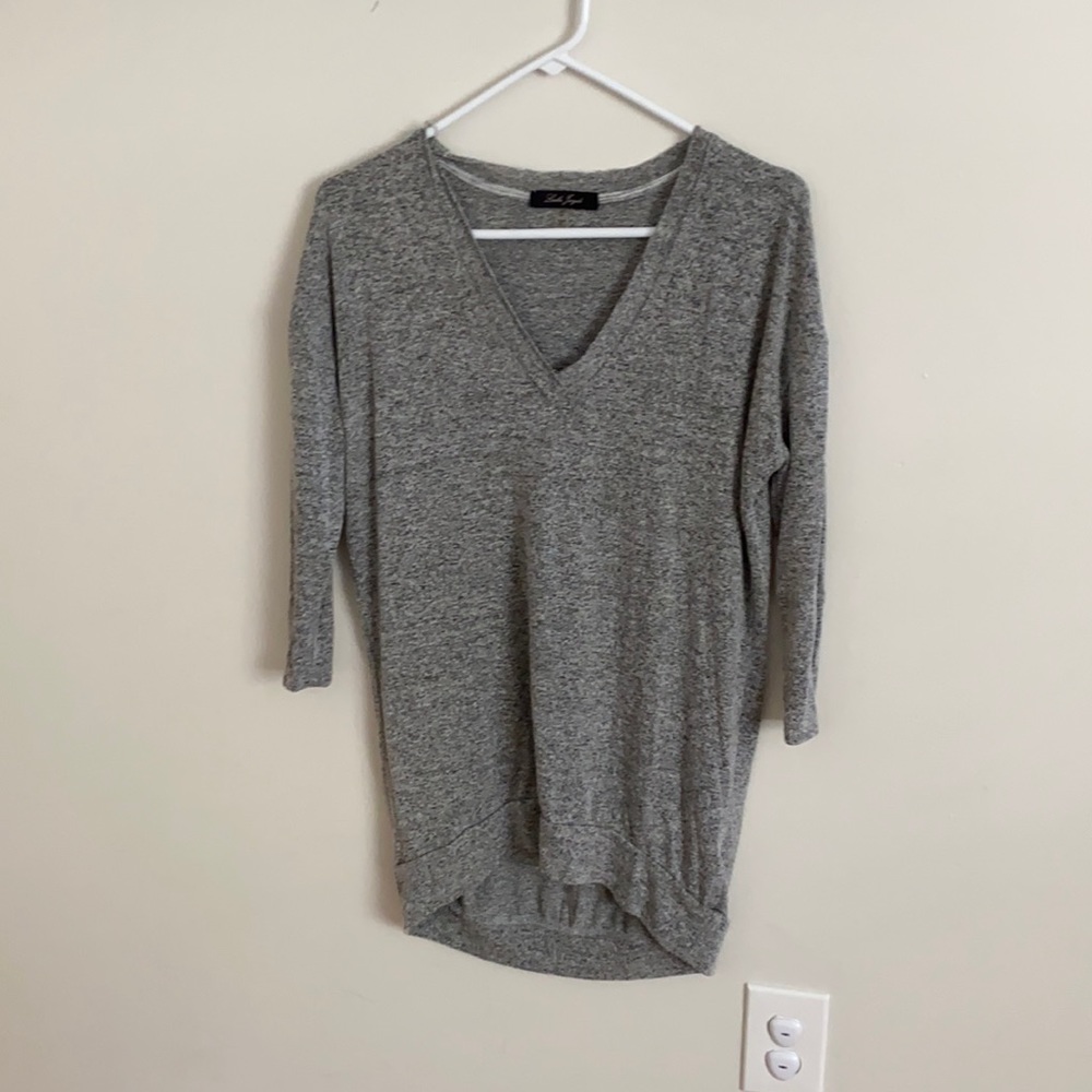 Grey v-neck tunic with raw edge neckline